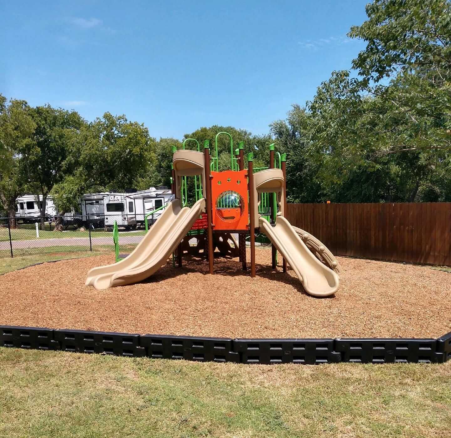 The children's playground at Pecan Grove RV Resort